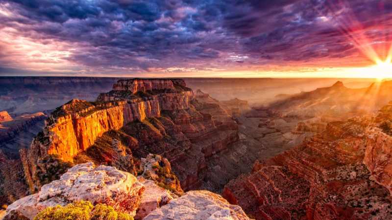 Visit the West Rim of the Grand Canyon on this full-day coach tour from Las Vegas. Travel by bus, and pass by Lake Mead and a Joshua Tree Forest on the way. At the Grand Canyon, upgrade to a guided tour or explore Eagle Point and Guano Point on your own. Additional upgrades include a Skywalk and a helicopter and boat ride below the rim. Stop at the Hoover Dam on the way back.